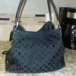 Black signature coach